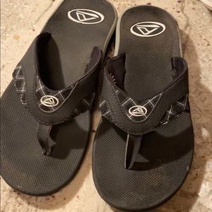 Reef flip flops black and white size 10 good cond.